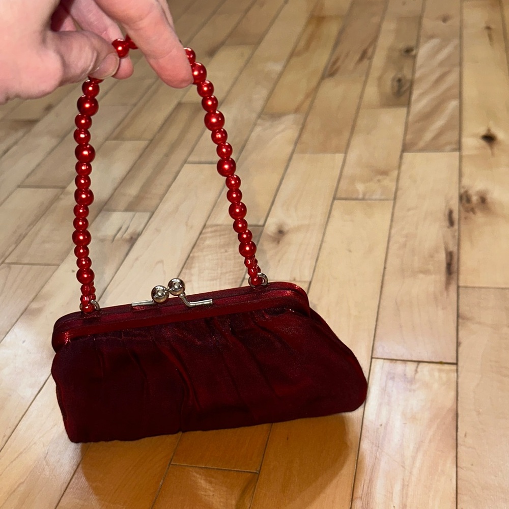 La Regale Elegant Red Iridescent Beaded Handle Clutch with Kisslock closure